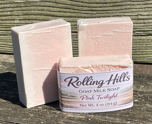 Three bars of soap with 'Rolling Hills' branding on a wooden surface.