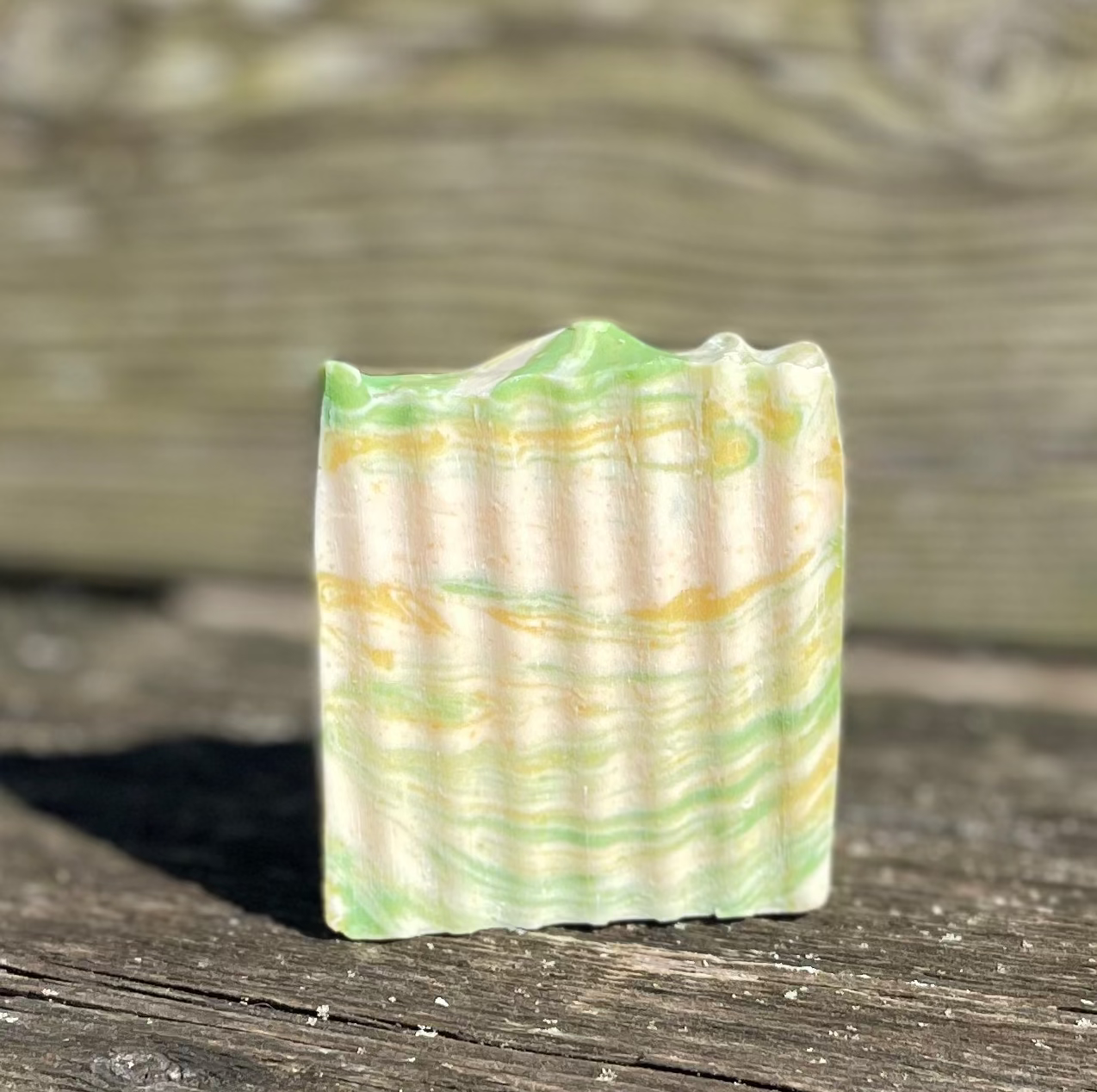 Soap with a waffle pattern on a wooden surface